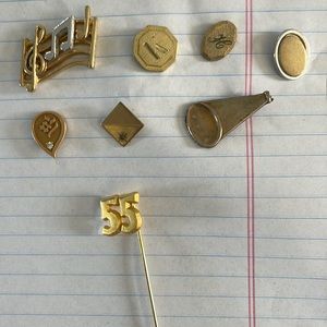 7 tie tacks and 1 lapel 55 pin